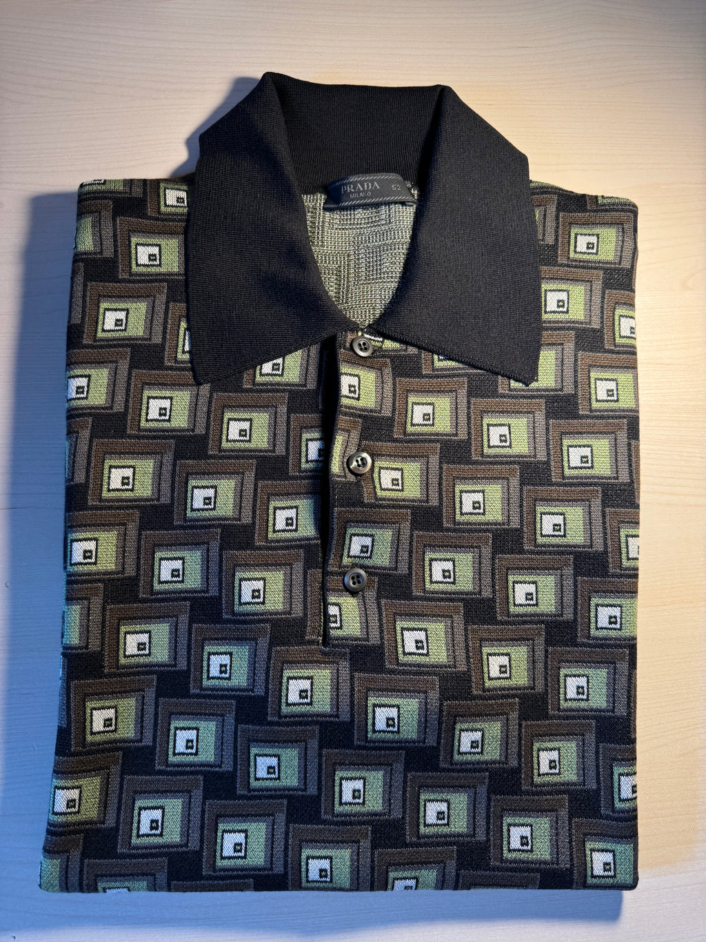 Polo in seta Prada