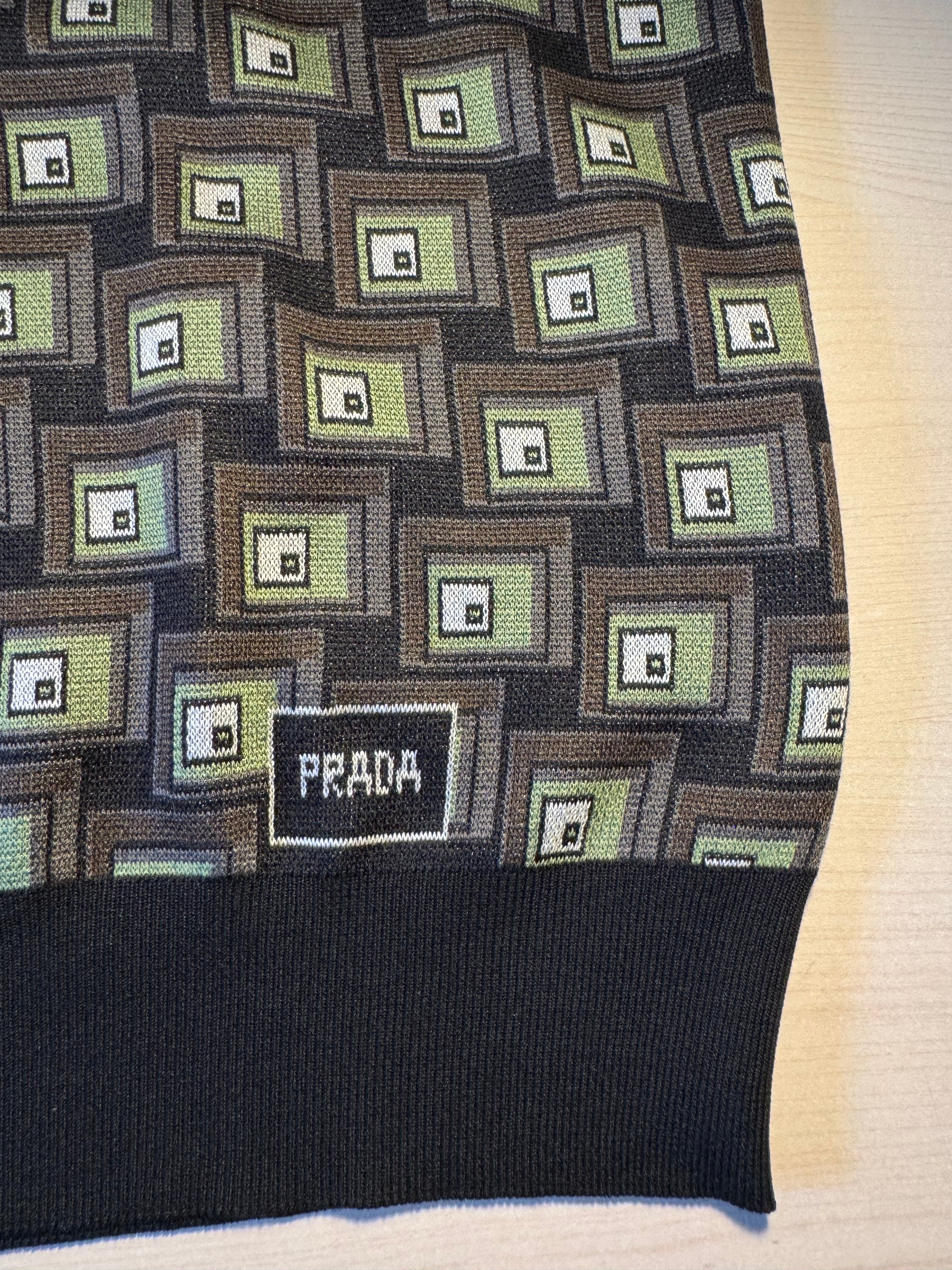 Polo in seta Prada