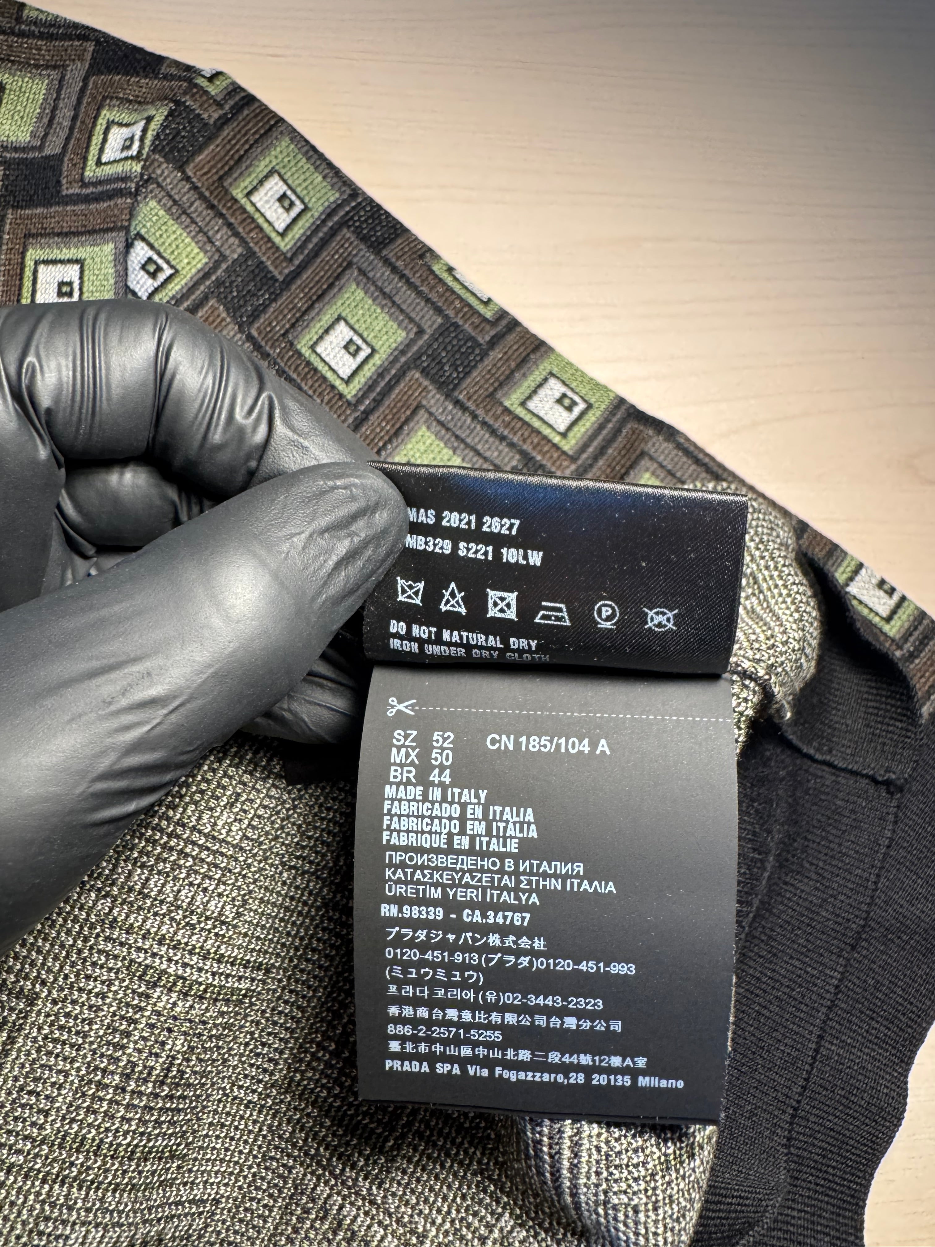 Polo in seta Prada